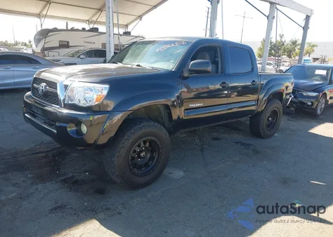 2009 Toyota Tacoma Base V6 из США, поврежденный, VIN 3TMLU42N99M020422